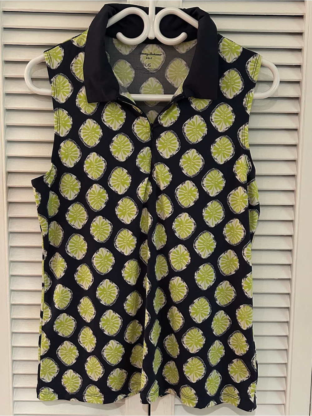 Tommy Bahama Sleeveless Collared Print Golf Top. Navy Blue/Lime Green Pattern